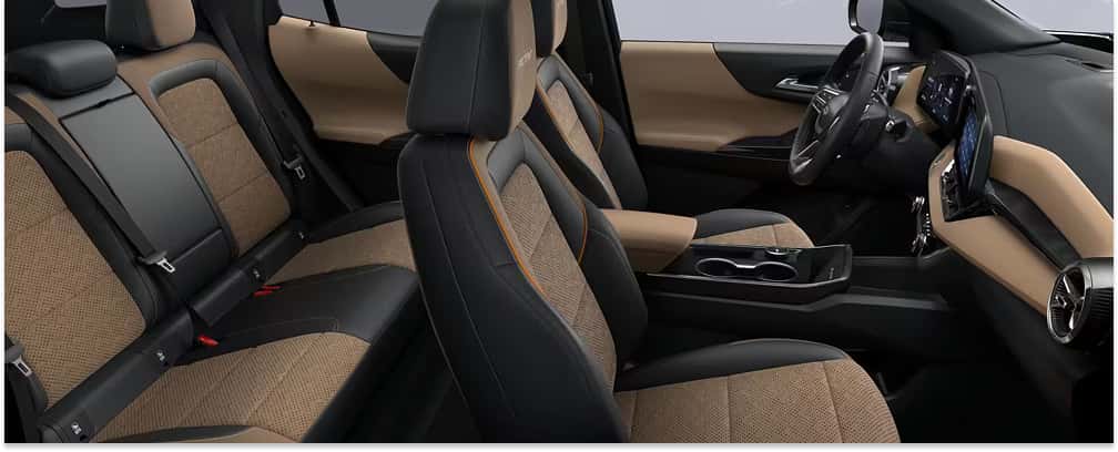 Interior view of a 2026 Chevrolet Equinox featuring two-tone black and tan seating.