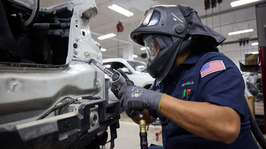 Collision associate working on a vehicle