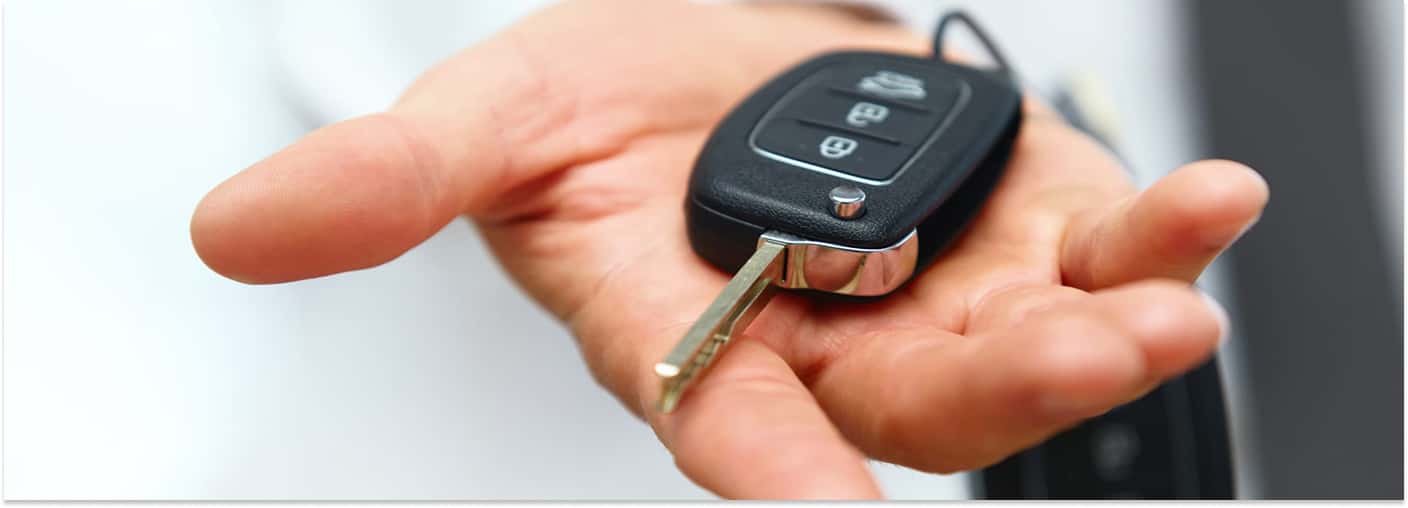 Open Hand Handing Over Car Keys