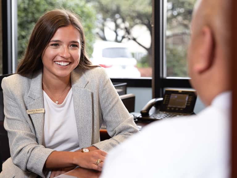 Associate speaking with a customer.