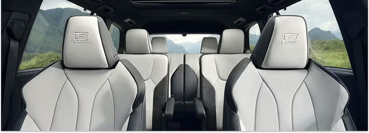 Interior view of the 2026 Lexus TX showcasing the three-row cabin with two-tone F SPORT leather seats.
