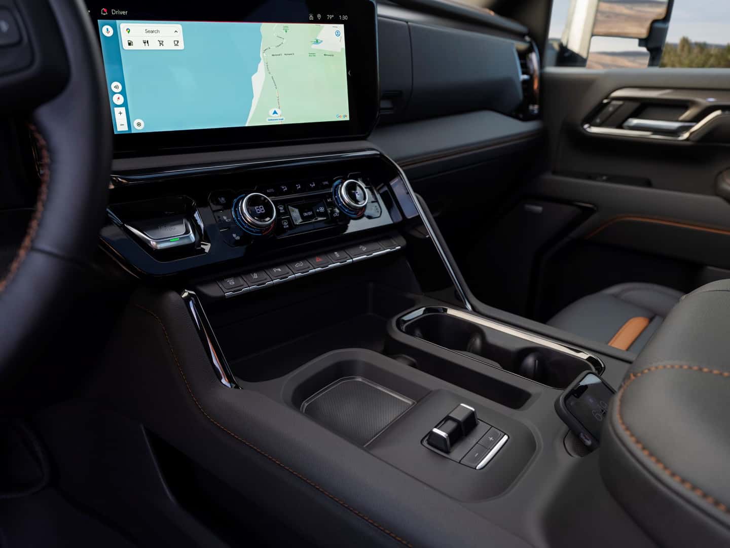 The Advanced Technologies Of The Terrific 2024 GMC Sierra 2500 HD's Center Console