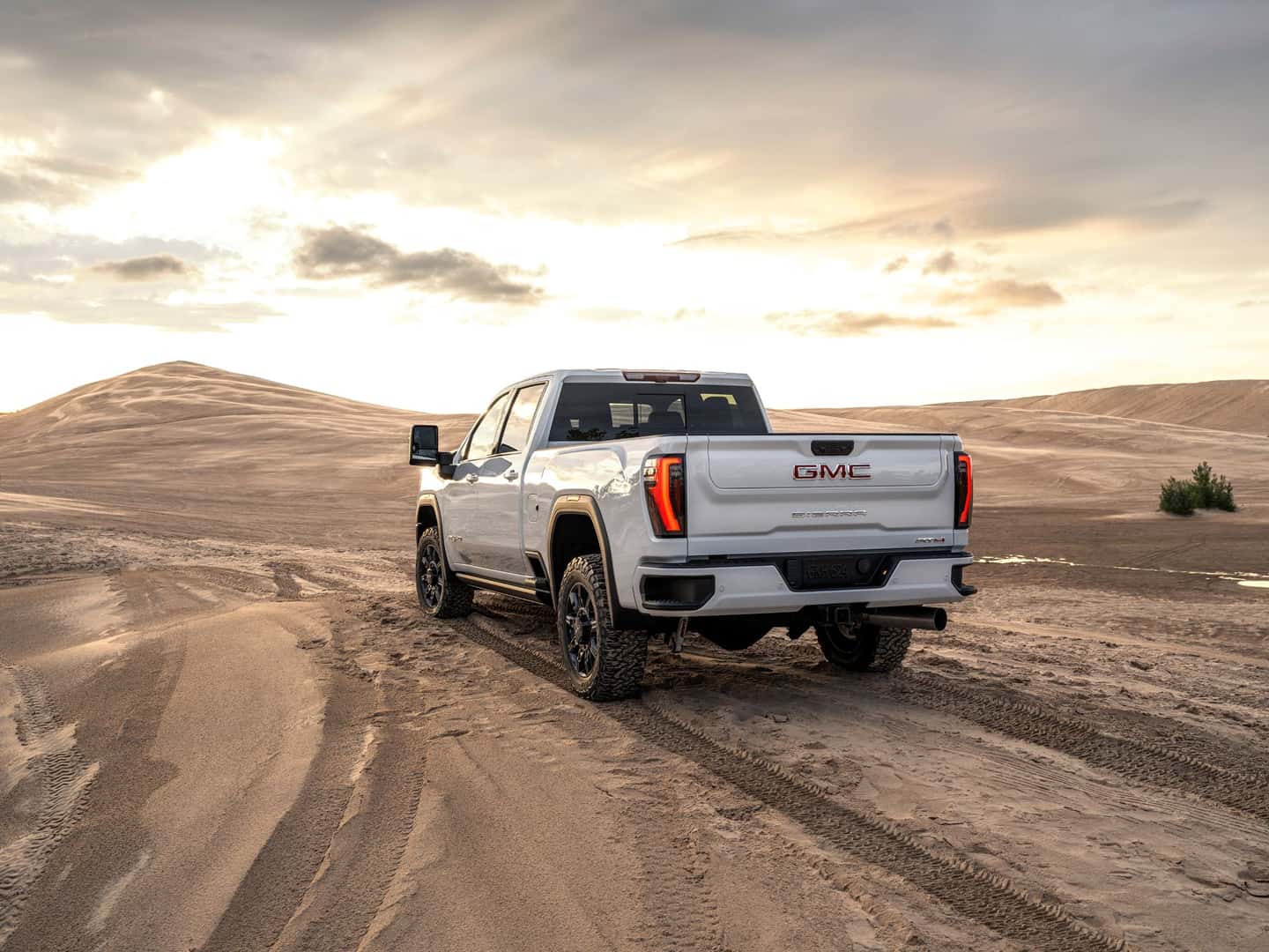 The Beautiful Backside Of The Reliable 2024 GMC Sierra As It Drives Towards More Epic Sand Dunes