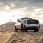 The Family Friendly And Useful 2024 GMC Sierra 2500 HD AT4 Epically Racing Over Sand Dunes