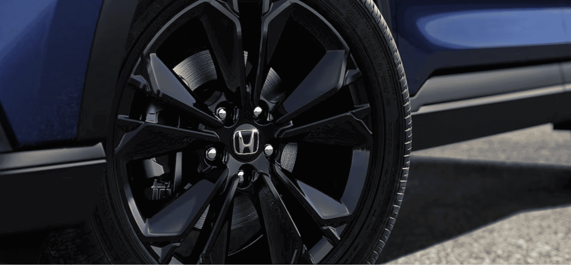 2026 Honda CR-V Hybrid trims offer exclusive sport styling, like gloss-black alloy wheels and trim accents