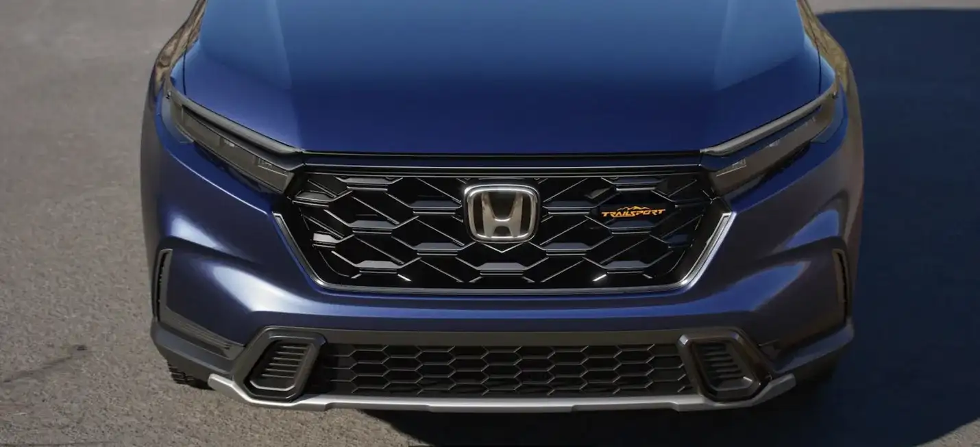 The 2026 Honda CR-V TrailSport Hybrid shown in Canyon River Blue Metallic