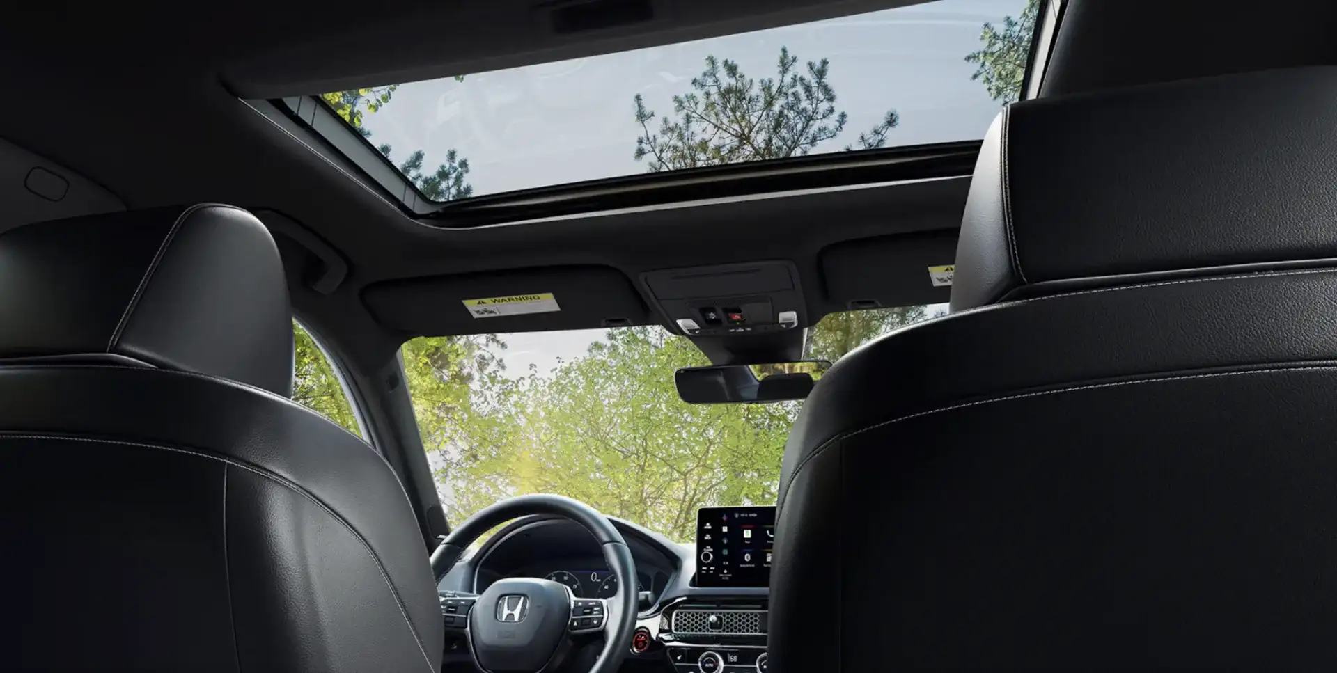 2026 Honda Sport Touring Hybrid interior shown with Black Leather