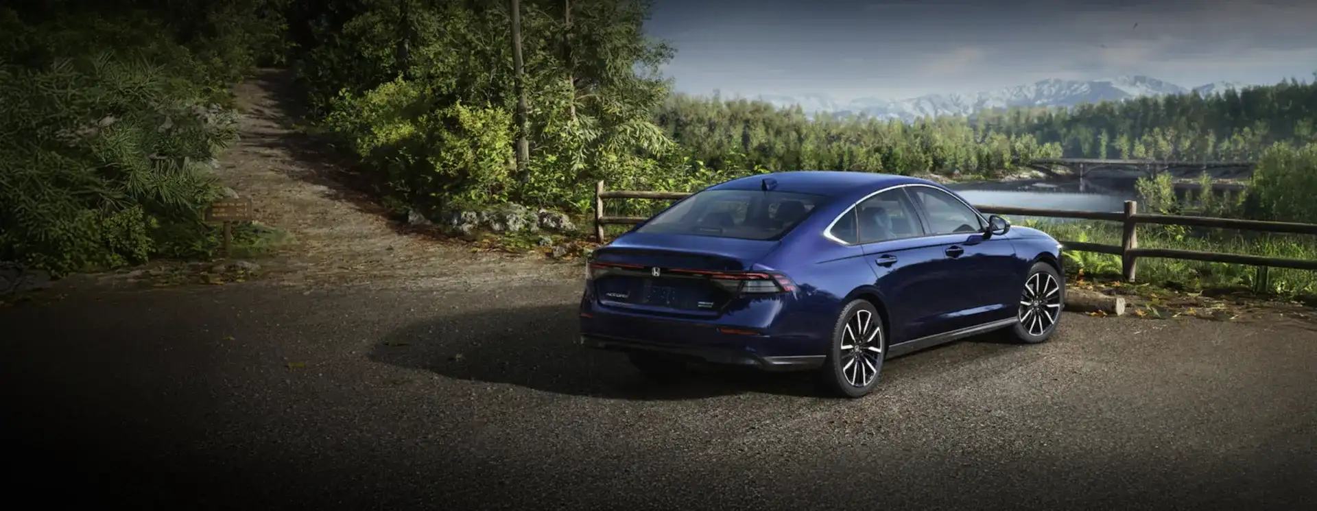 The 2026 Honda Accord Touring Hybrid shown in Canyon River Blue Metallic