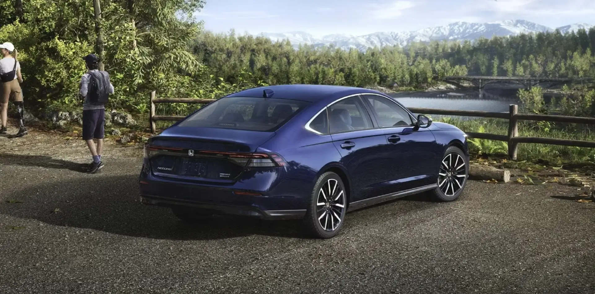 2026 Honda Accord Touring Hybrid shown in Canyon River Blue Metallic.