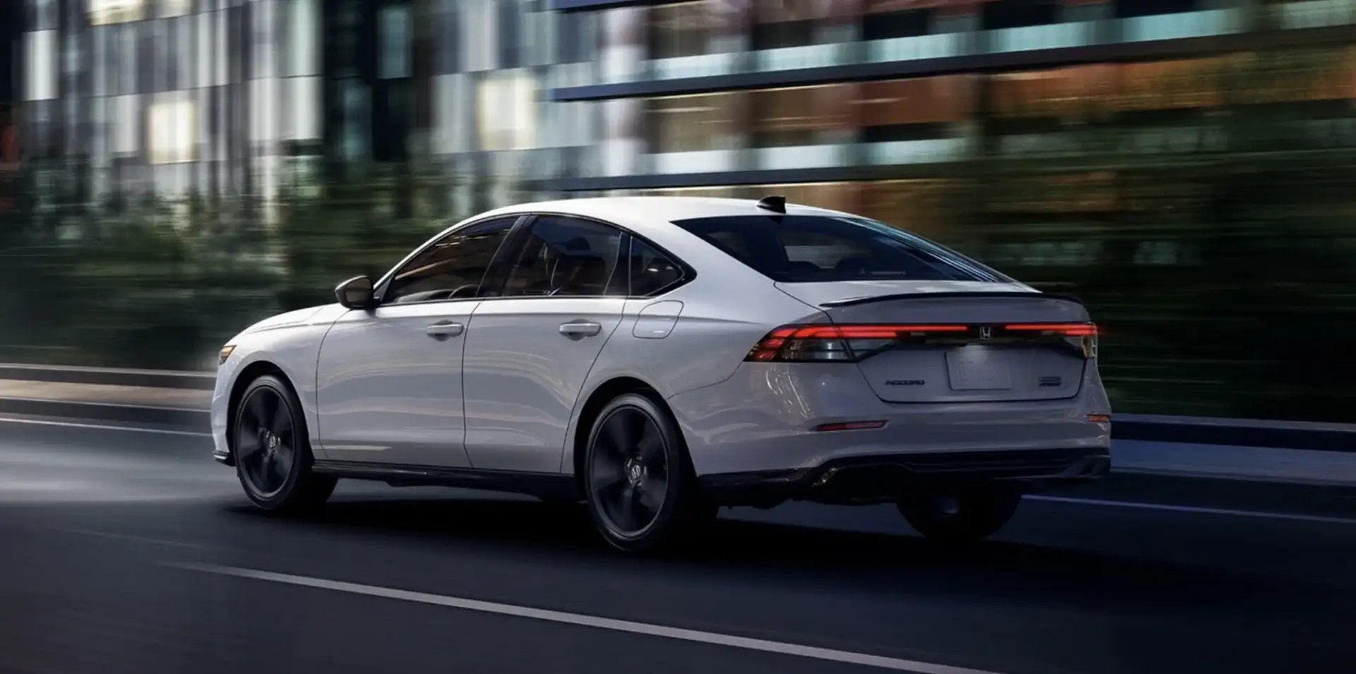 The 2026 Honda Accord Sport-L Hybrid shown in Platinum White Pearl