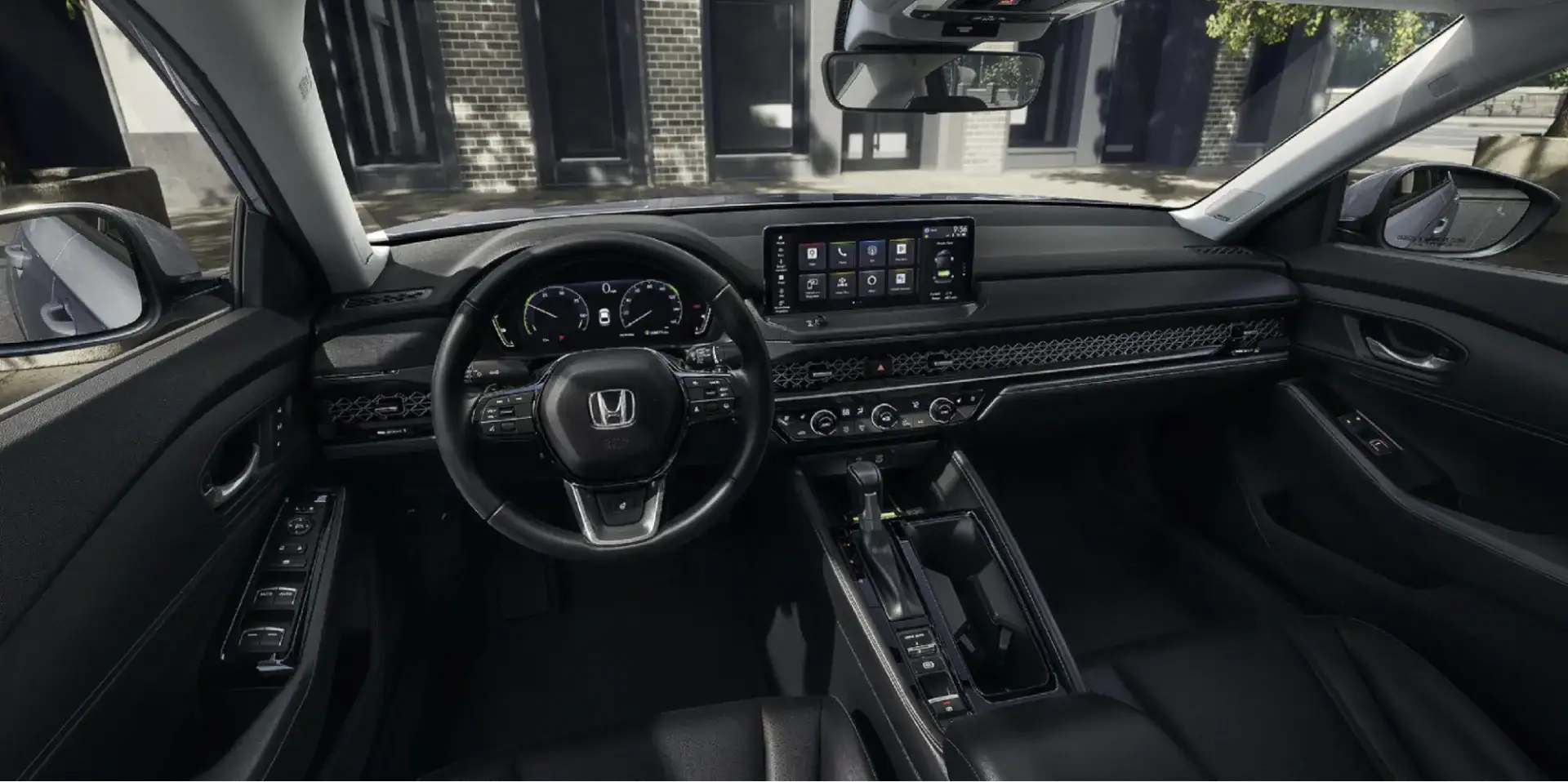 The 2026 Honda Accord Touring Hybrid shown with Black Leather