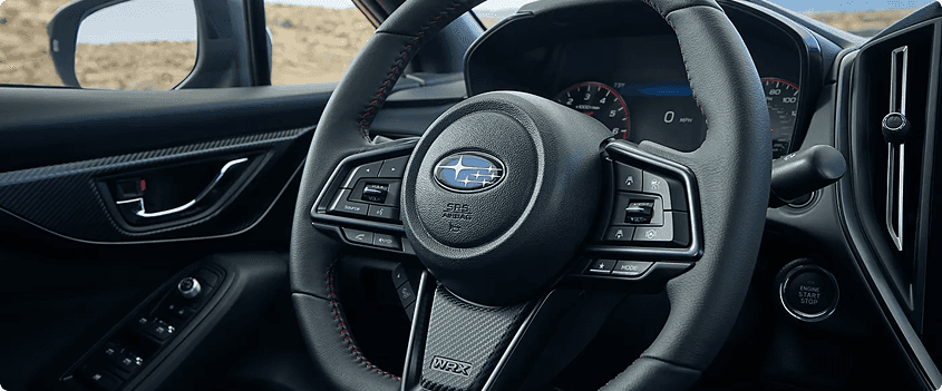 D-Shaped Steering Wheel and 
Quick-Ratio Dual-Pinion Steering