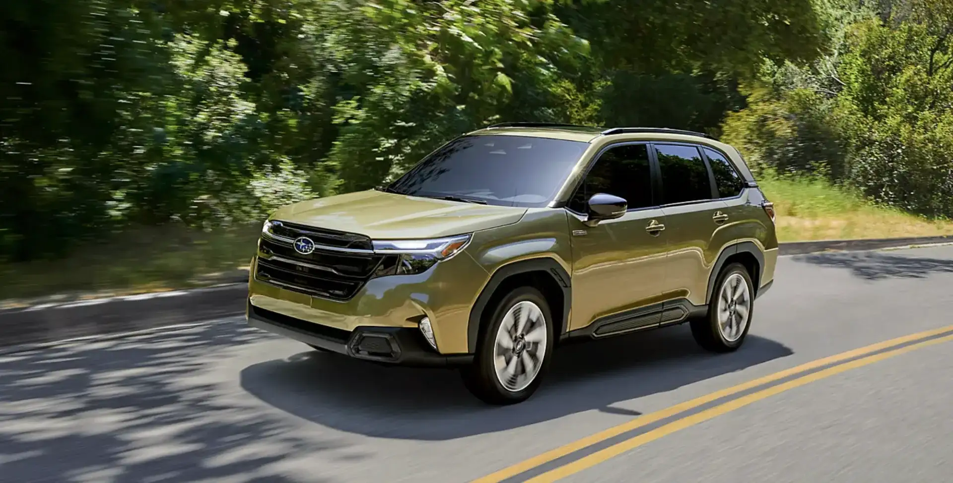 The 2026 Subaru Forester Touring Hybrid shown in Autumn Green Metallic