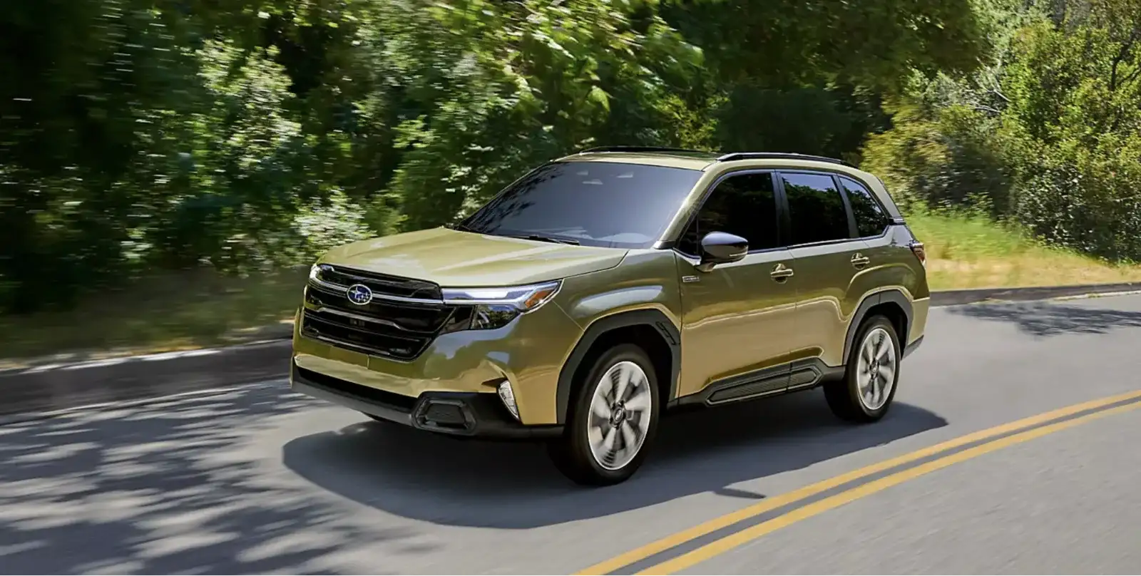 The 2026 Subaru Forester Touring Hybrid shown in Autumn Green Metallic