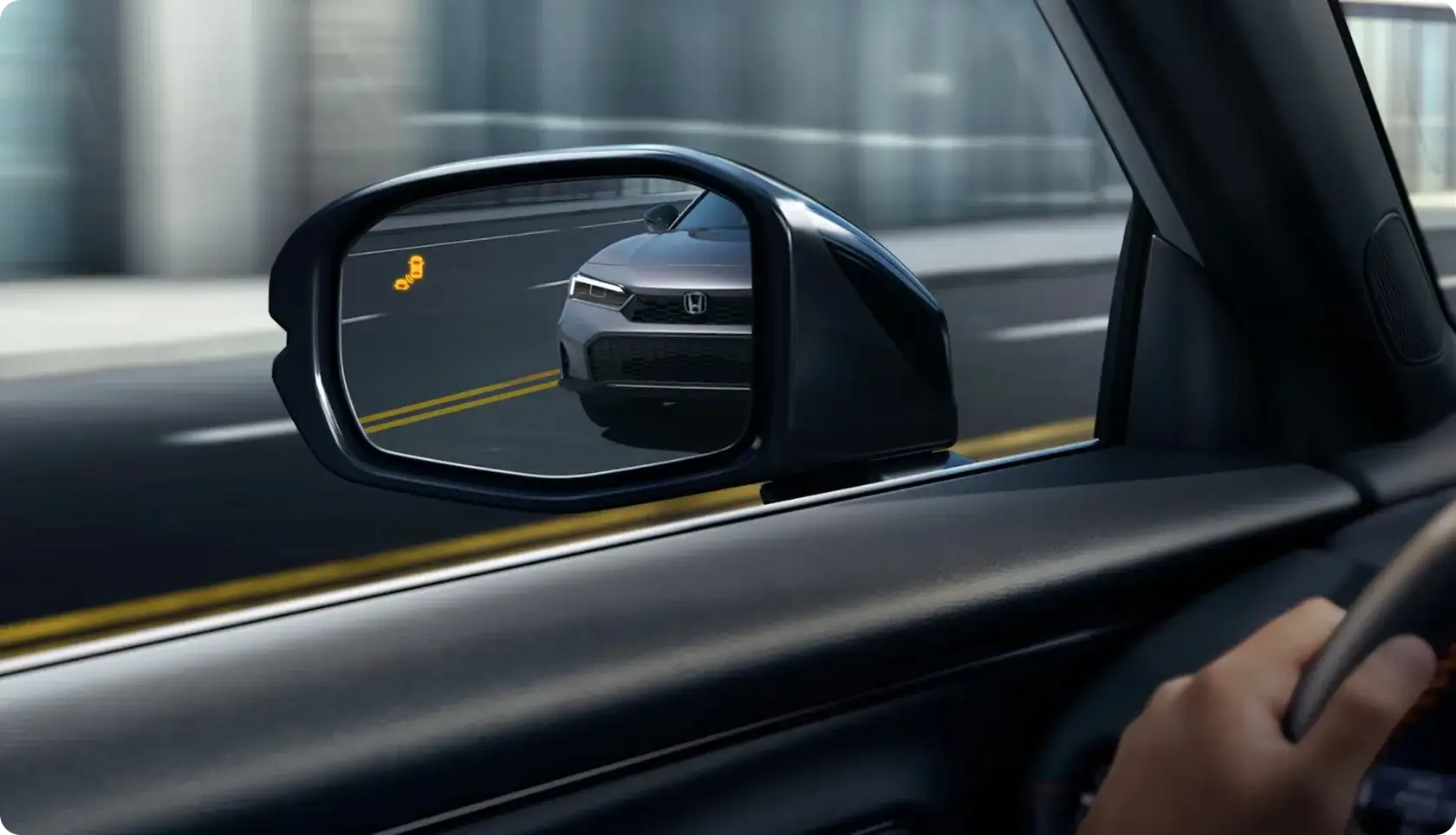 Blind Spot Information System helping the 2027 Honda HR-V driver change lanes safely