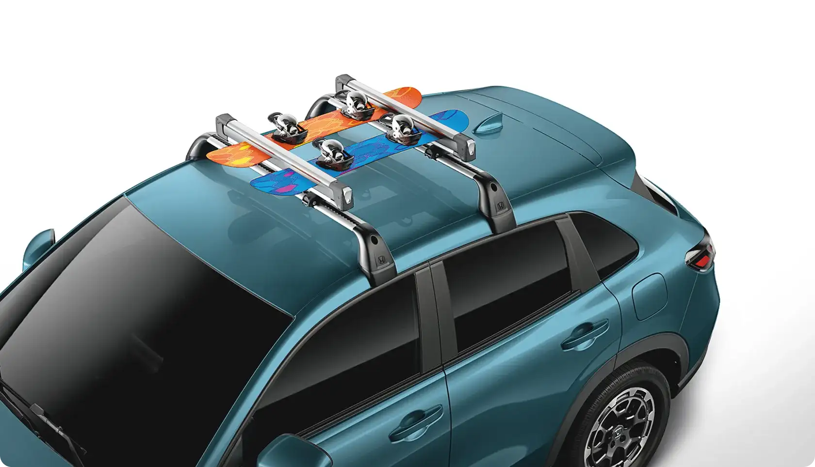 Snowboard and ski attachment accessory mounted on the 2027 Honda HR-V roof rack