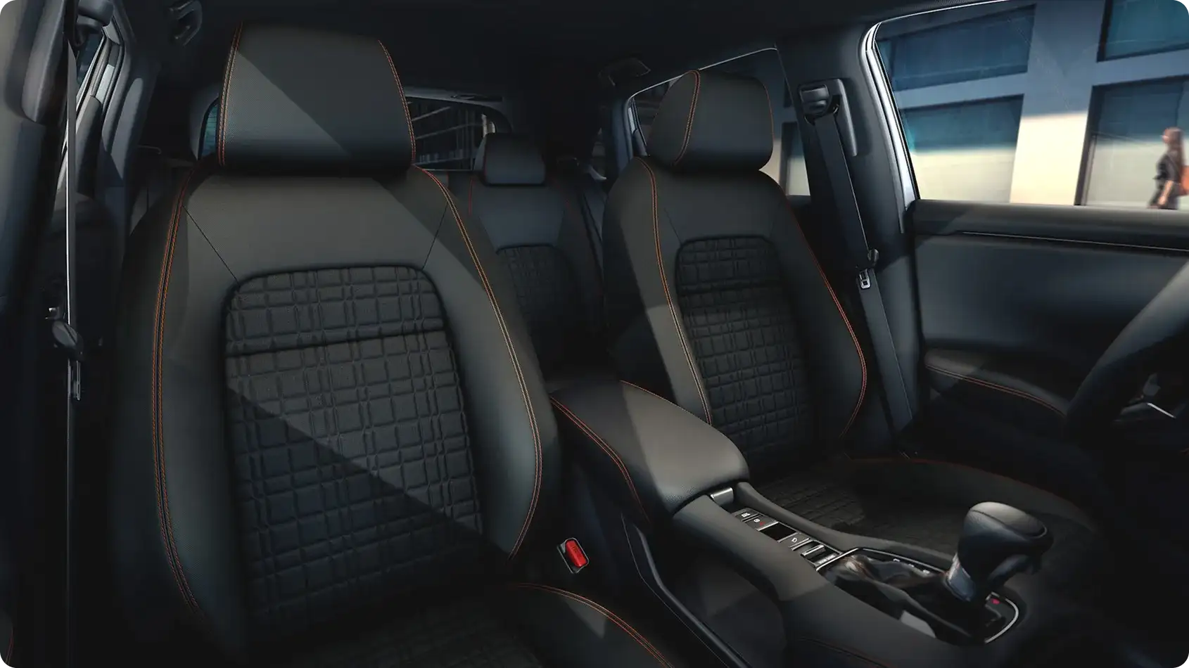 All-black 2027 Honda HR-V Sport interior with orange stitching and honeycomb trim
