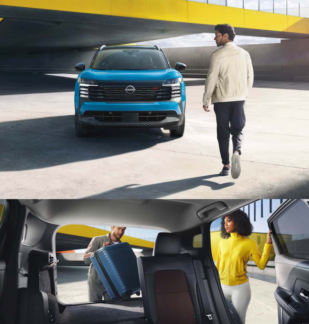 Man walking toward a blue Nissan SUV parked in a parking garage, and a couple loading luggage into the spacious rear cargo area