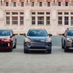 Three of all-new redesigned 2026 Toyota RAV4 parked beside each other in different exterior colors.