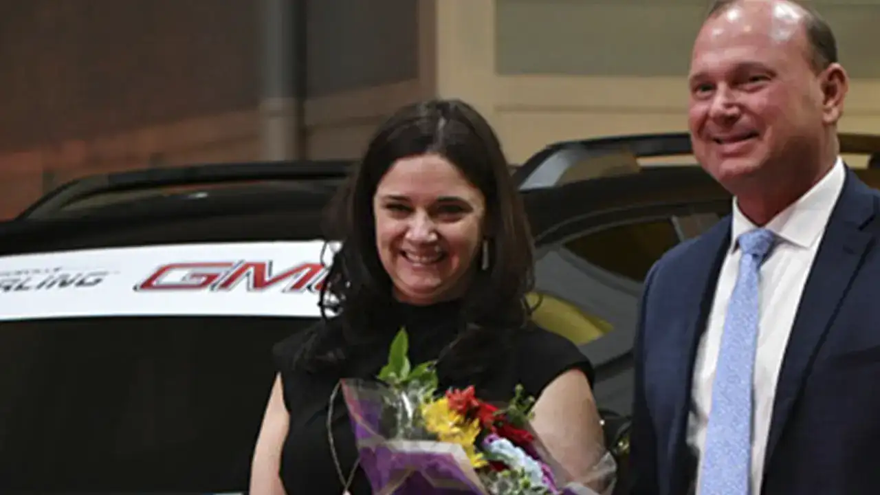 Teacher of the Year receives flowers at Starling GMC