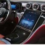 Dashboard and front interior cabin of a 2026 Mercedes-Benz C-Class Sedan with central portrait touchscreen display.