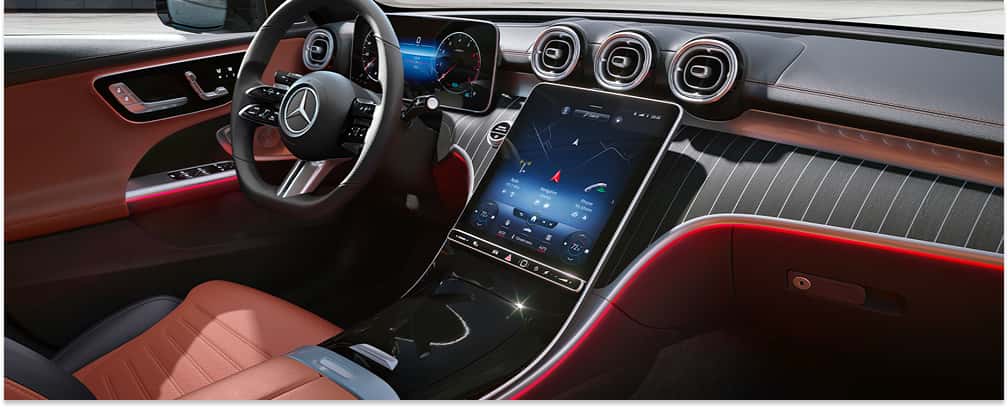 Dashboard and front interior cabin of a 2026 Mercedes-Benz C-Class Sedan with central portrait touchscreen display.