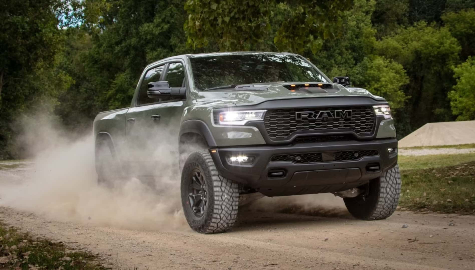Ram 1500 driving down a dirt road