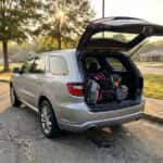 2026 Dodge Durango rear liftgate open with school gear loaded at a Prattville, AL school drop-off