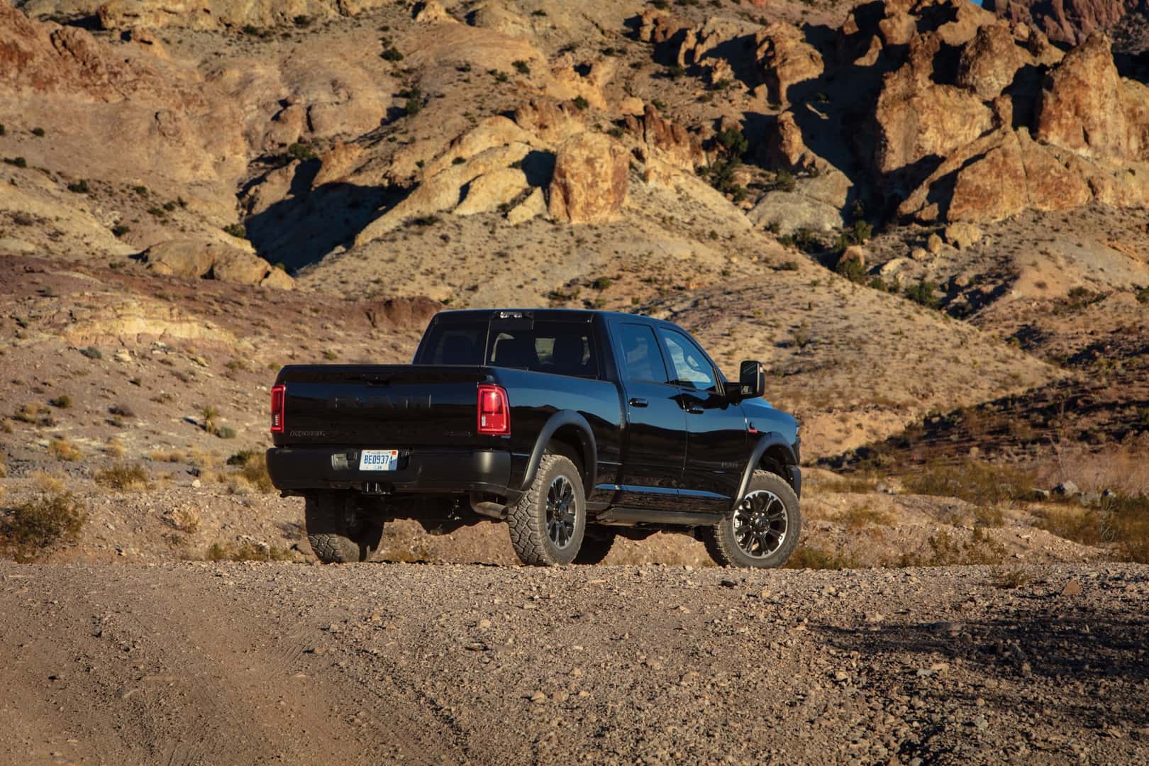 2026 Ram 2500 Heavy Duty Rebel rear view rocky terrain