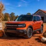 2026 Ford Bronco Sport at a fall pumpkin patch in rural central Alabama with orange pumpkins in the foreground