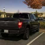 2026 Ford F-150 SuperCrew parked in a Montgomery shopping center lot during the holiday season