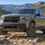 2026 Ford Maverick Tremor driving over a rocky trail