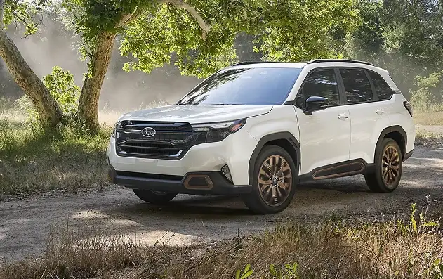White 2026 Subaru Forester parked on a dusty backroad