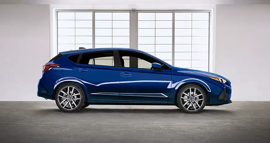 Side profile of a blue 2026 Subaru Impreza