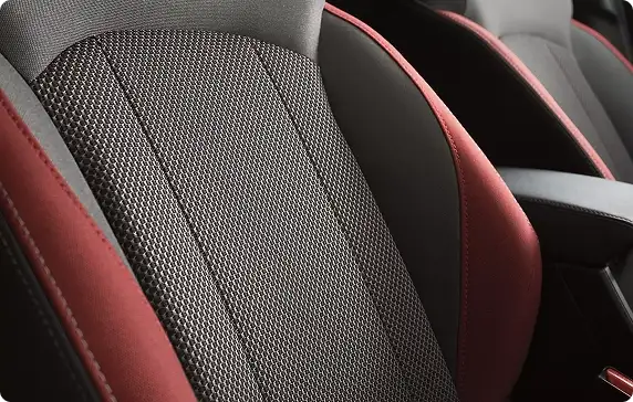Close-up of Impreza RS sport seats with red accents and contrast stitching