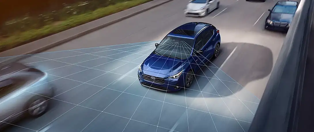 Overhead view of a blue 2026 Subaru Impreza with EyeSight sensing zones highlighting surrounding traffic