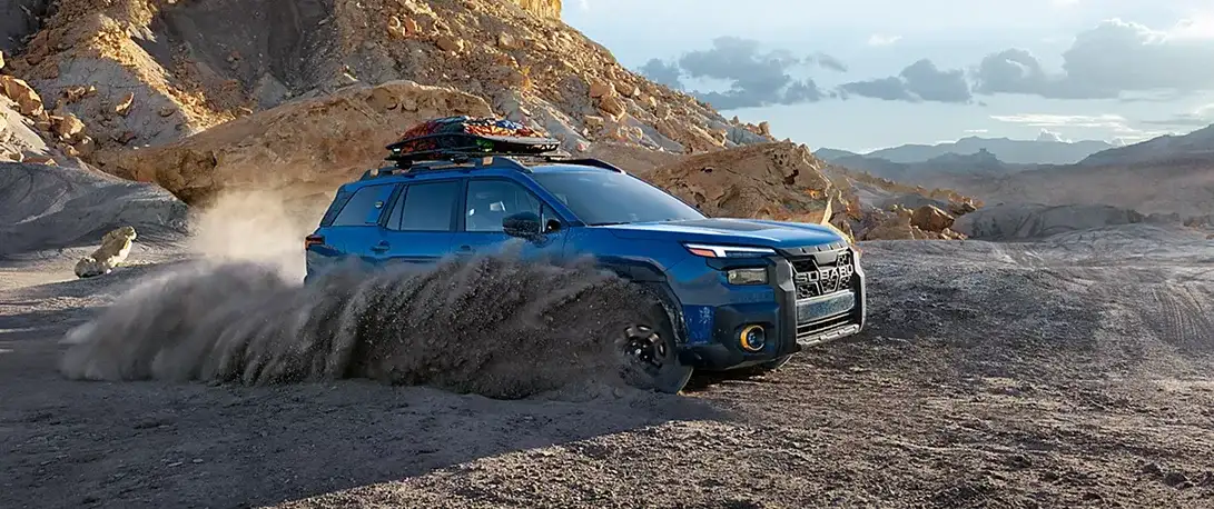 2026 Subaru Outback Wilderness climbing a rugged trail