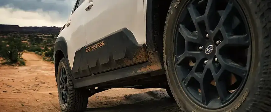 2026 Subaru Crosstrek climbing rough terrain with X-MODE