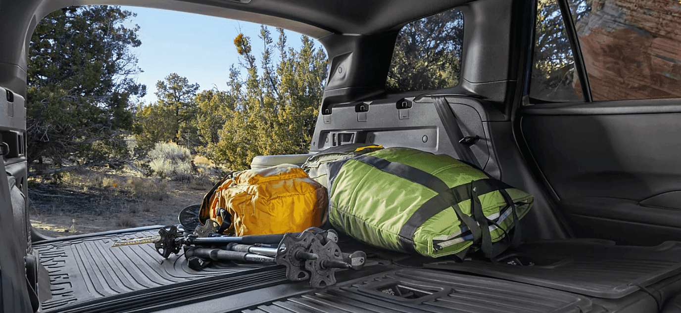 Subaru Outback Wilderness cargo area with removable cargo tray, 60/40-split flat-folding rear seatbacks, and seatback protectors