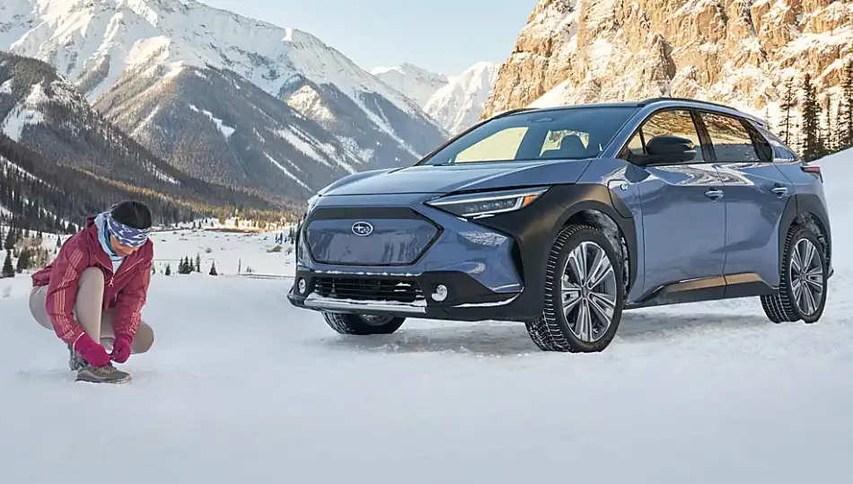 All-electric Subaru SUV handling snow-covered roads with confidence