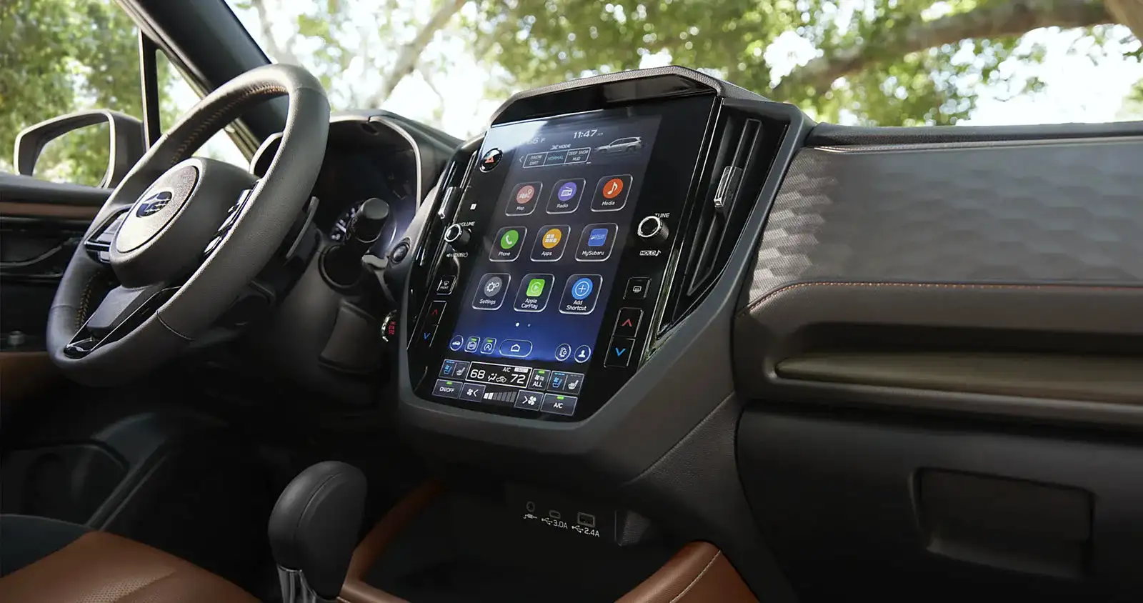 The 2026 Subaru Forester cockpit with the vertical touchscreen and brown leather seating