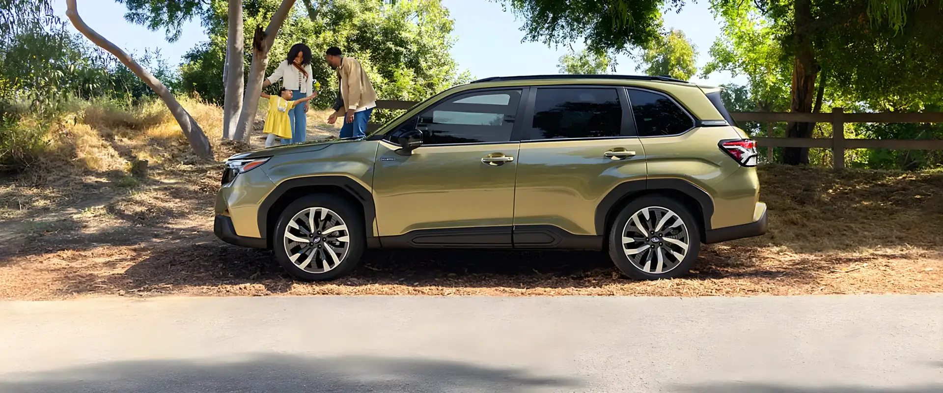 2026 Subaru Forester Hybrid driving on a scenic road in Las Vegas, NV