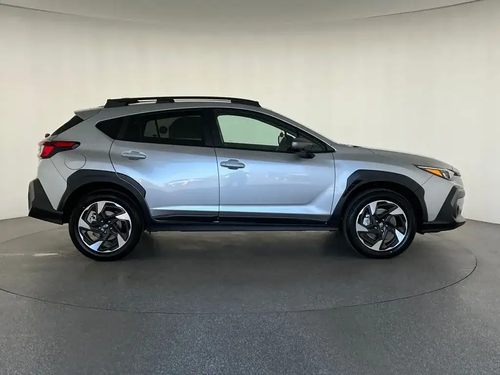 Subaru Crosstrek in silver, driver-side profile, at Findlay Subaru of Las Vegas, photo 2 of 14
