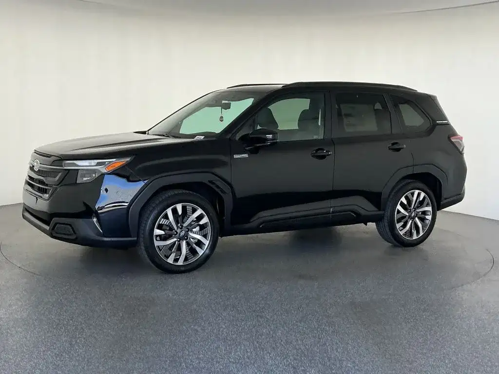 Subaru Forester in black, angled front view, photo 7 of 12