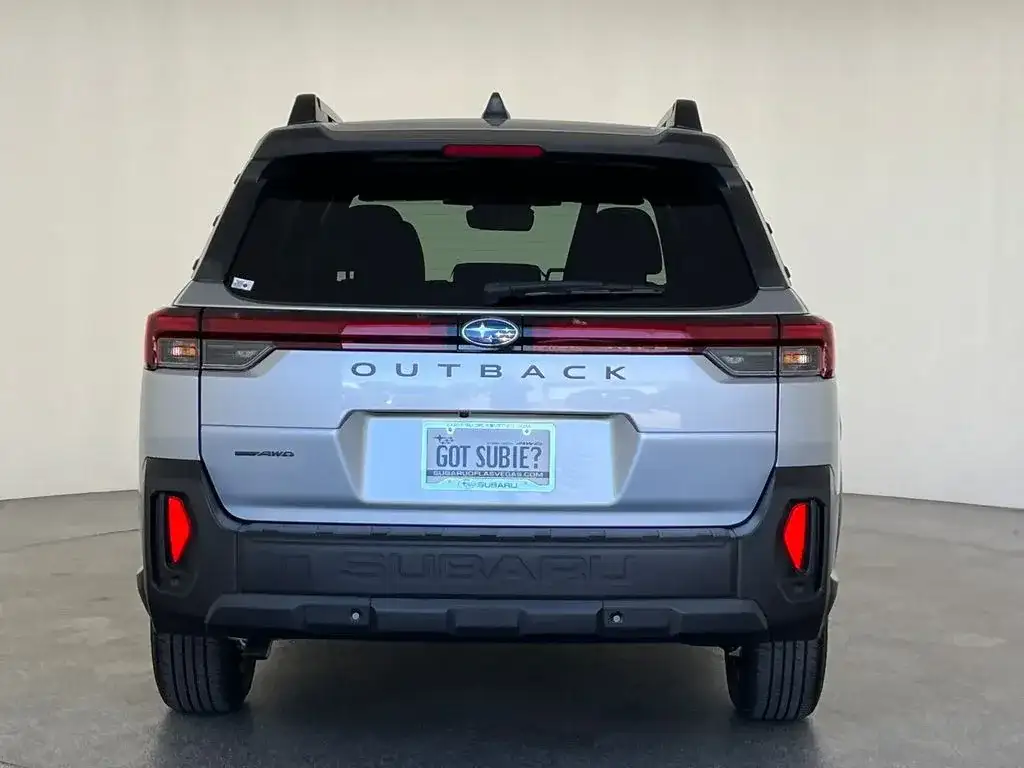 Subaru Outback in silver, angled front view, photo 4 of 11