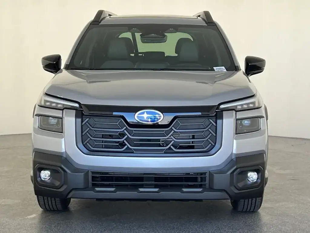 Subaru Outback in silver, head-on front view showing the grille, photo 8 of 11