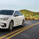 White 2023 Subaru Legacy White Exterior on a Country Road