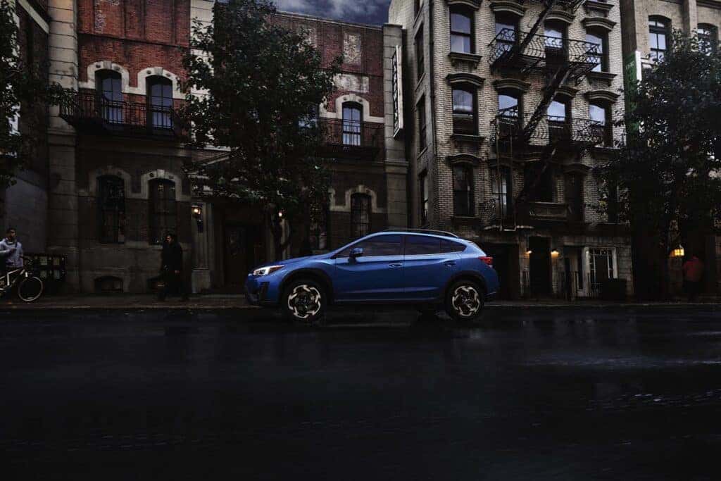 Subaru Crosstrek Parked on a Dark City Curb