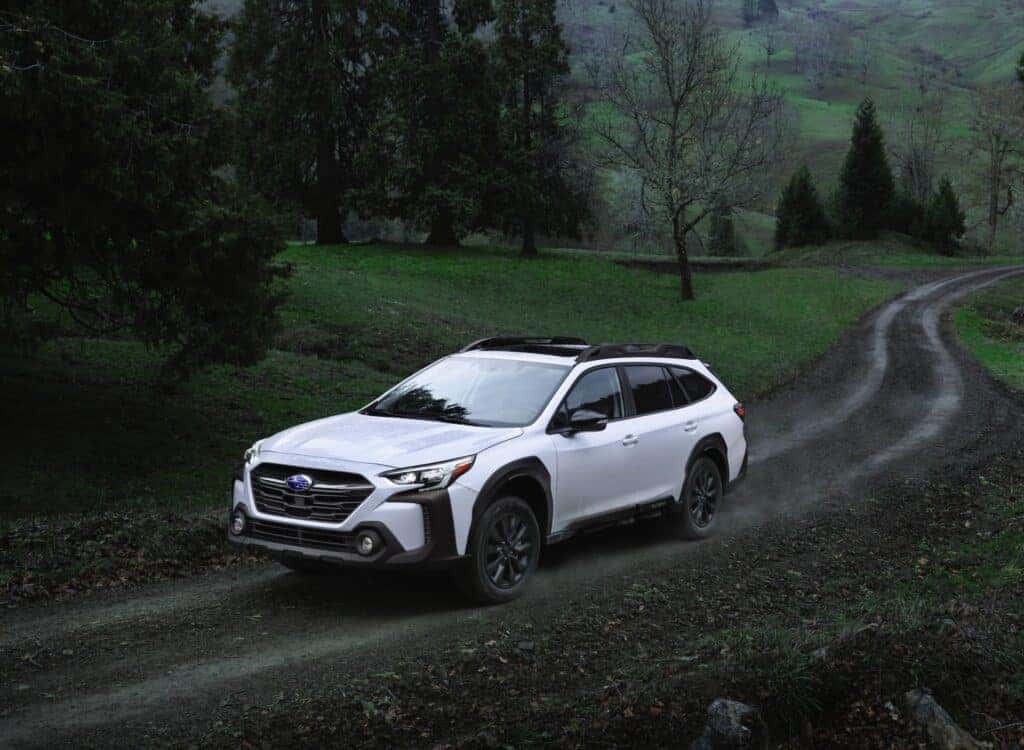 The Miraculous 2023 Subaru Outback Riding Down Dirt Paths In A Dark Forest