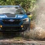 Geyser Blue 2023 Subaru Outback Wilderness Driving through Water